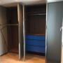 Menuiserie Luquiens - dressing sur-mesure avec tiroirs portes ouvertes - Coppet