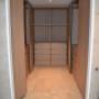 Menuiserie Luquiens - dressing sur-mesure avec tiroirs bois - Coppet