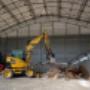 REWAG – Hangar mit Bagger Hintergrund