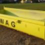 REWAG – Gelbe Mulde mit REWAG beschriftet