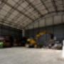 REWAG – Hangar mit Bagger Hintergrund Weitwinkel