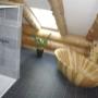 Blockhausbau mit unserer Fussbodenheizung
Badezimmer im Obergeschoss mit massiver, freistehender Badewanne.
Boden: Norit Therm Fussbodenheizung