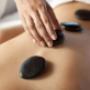 Massage aux pierres chaudes Genève