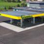 AGROLA Tankstelle in Romont, Agrola station service à Romont, avec TopShop, vue d'ensemble, Aufnahme aus Vogelperspektive, Dach mit Solarzellen, Toit avec cellules solaires