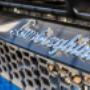Close-up detail of a Lamborghini supercar badge highlighting the premium automotive brand.
