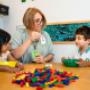 Teacher and children during a counting and sorting activity at ELABasel international preschool