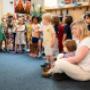 Children and teacher during a group singing session at ELABasel International preschool